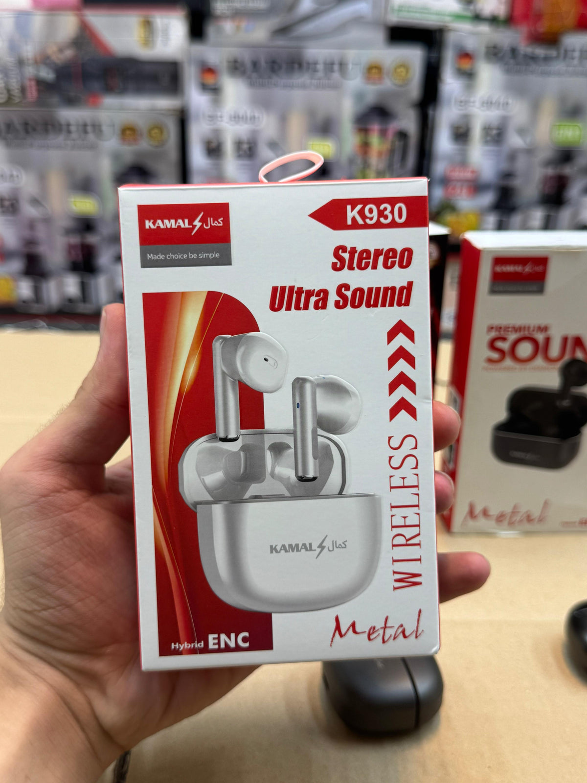 Metallic earbuds in use