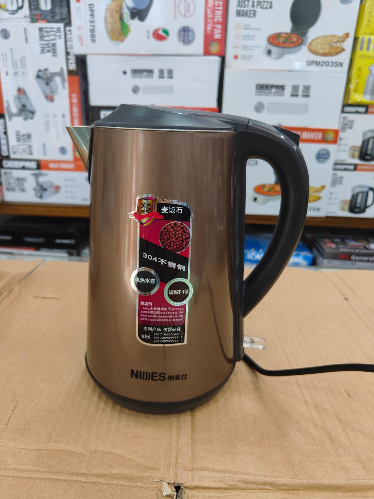 NIIDES Heating Stones Electric Kettle KM-701