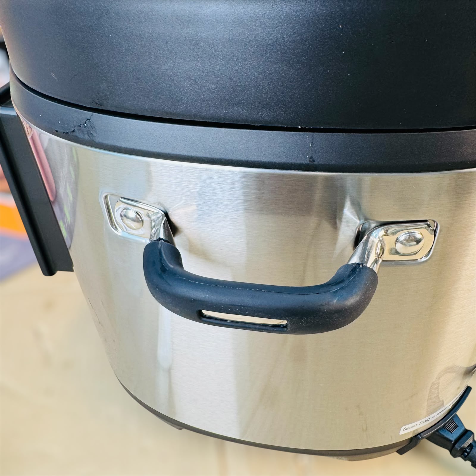 DSP electric pressure cooker side view with safety valve