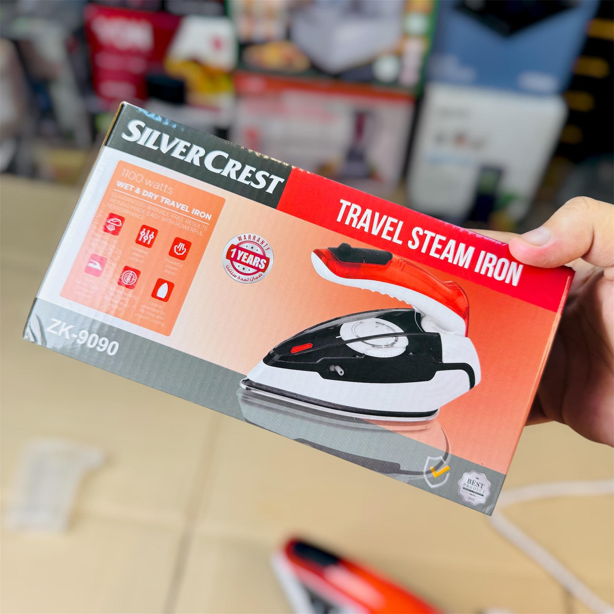 Silver Crest travel iron in use